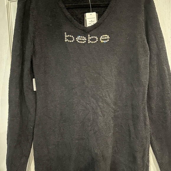 Bebe women’s sweater dress. Black in color. Size XL - Picture 1 of 2